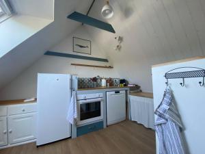 Kuchyň nebo kuchyňský kout v ubytování Maison avec terrasse vue sur mer