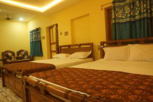 Voodi või voodid majutusasutuse DKS Illam toas