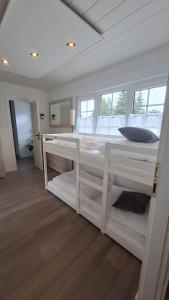 Giường trong phòng chung tại Ferienhaus Ameliè