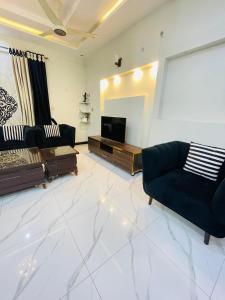 Φωτογραφία από το άλμπουμ του Cozy & comfy House σε Ραβαλπίντι