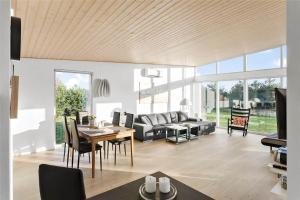 a living room with a couch and a table at M14010-Vaeggerlose-Savavej-29 in Marielyst