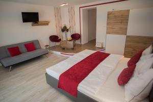 TV a/nebo společenská místnost v ubytování EHM - Modernes Apartment nahe Therme & Natur