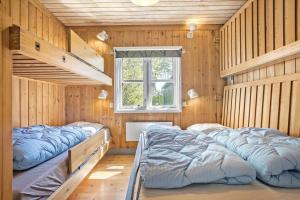 Postel nebo postele na pokoji v ubytování M126-Vaeggerlose-Botolundvej-51