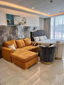 Χώρος καθιστικού στο Legit Luxury Apartment at Accra KASS Studio Ensuite
