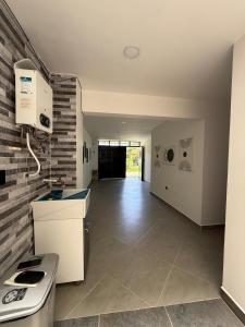 Photo de la galerie de l'établissement Primer piso con Garaje, à Guatapé