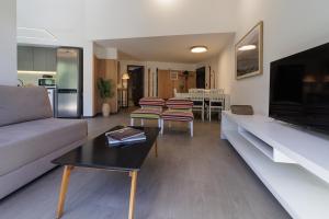 TV a/nebo společenská místnost v ubytování Lupinos San Martin de los Andes