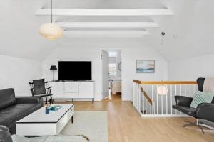 Μια τηλεόραση ή/και κέντρο ψυχαγωγίας στο M321-Vaeggerlose-Marielyst-Strandvej-63-G