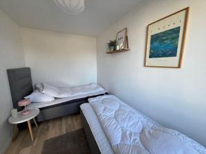 Ένα ή περισσότερα κρεβάτια σε δωμάτιο στο M321-Vaeggerlose-Marielyst-Strandvej-63-G