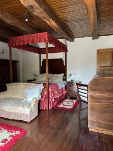 Ένα ή περισσότερα κρεβάτια σε δωμάτιο στο Casa da Eira