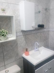 Koupelna v ubytování Apto aconchegante para descansar 03