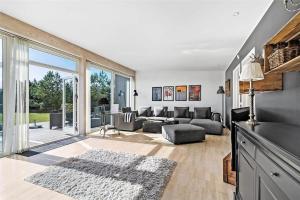 a living room with a couch and a table at M167-Vaeggerlose-Savavej-31 in Marielyst