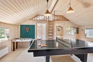 a large room with a ping pong table in it at M310-Vaeggerlose-Musestien-2 in Marielyst