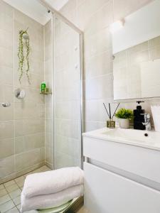 a bathroom with a shower and a sink at Lagoon - The Blyde in Pretoria