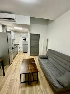 Η κουζίνα ή μικρή κουζίνα στο Apartamentos PIAS +4 φωτογραφίες