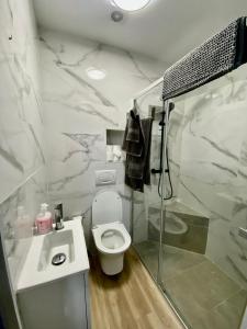 Ένα μπάνιο στο Apartamentos PIAS