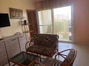 TV a/nebo společenská místnost v ubytování Ladiola