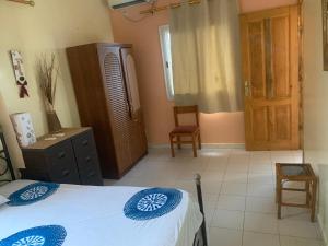 Postel nebo postele na pokoji v ubytování Ladiola