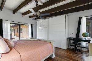 a bedroom with a bed and a ceiling fan at Pony Soldier Sedona Escape in Sedona