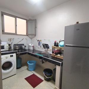 Kuchyň nebo kuchyňský kout v ubytování Maison d'hôte Najah 2