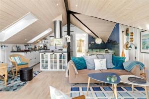 a living room with a couch and a table at L18-Rodby-Vibevej-9 in Rødby
