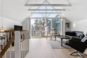 Μια τηλεόραση ή/και κέντρο ψυχαγωγίας στο M13007-Vaeggerlose-Marielyst-Strandvej-63-Z