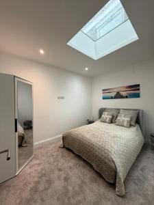 Ένα ή περισσότερα κρεβάτια σε δωμάτιο στο Cozy getaway