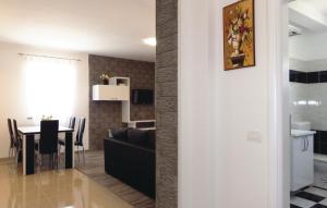 Kuchyňa alebo kuchynka v ubytovaní Holiday House Pudarica