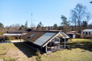 a pavilion with a pitched roof in a yard at M365-Gedser-Lollandsvej-9 in Gedser