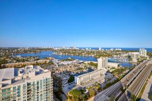 an aerial view of a city with a river and buildings at Omni Fort Lauderdale Hotel in Fort Lauderdale