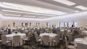 a banquet hall with white tables and chairs at Omni Fort Lauderdale Hotel in Fort Lauderdale +22 photos