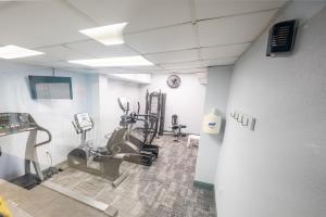 a gym with treadmills and ellipticals in a room at Pets welcome,direct oceanfront, poolside,1 bedroom in Myrtle Beach