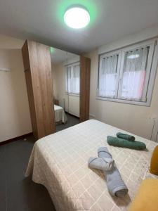 Ένα ή περισσότερα κρεβάτια σε δωμάτιο στο CASA B Entera 2 Habs Montaña Senderismo Playa