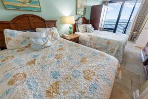 Ένα ή περισσότερα κρεβάτια σε δωμάτιο στο New Coastal Charm, Direct Oceanfront Views, Pools! +33 φωτογραφίες