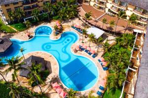 an overhead view of a swimming pool at a resort at Beach Park Suítes #209 - Beira mar por Carpediem in Aquiraz +16 photos