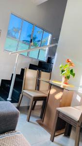 Posezení v ubytování Lugar tranquilo para sua família + 77 fotografií