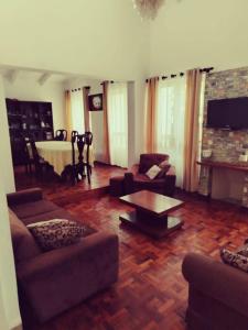 Μια τηλεόραση ή/και κέντρο ψυχαγωγίας στο Casa Agradable Alto Confort
