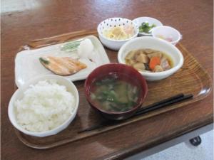 a tray of food with rice and vegetables on a table at Hotel Tetora Honhachinohe - Vacation STAY 97886v in Hachinohe