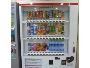 a vending machine filled with lots of drinks at Smile Hotel Kakegawa - Vacation STAY 77614v in Kakegawa