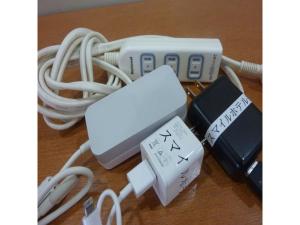 a nintendo wii game controller and other electronics on a table at Smile Hotel Kakegawa - Vacation STAY 77614v in Kakegawa +14 photos