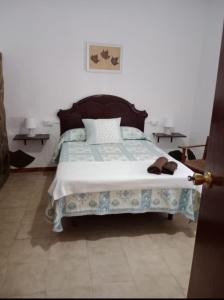 Giường trong phòng chung tại Casa la Torre +26 ảnh