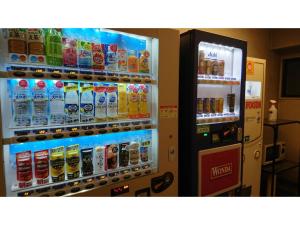 a vending machine filled with lots of different types of drinks at Smile Hotel Nagoya Shinkansenguchi - Vacation STAY 05077v in Nagoya