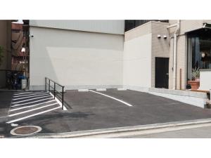 a parking lot in front of a building at DIG the Osaka - Vacation STAY 96973v in Suita
