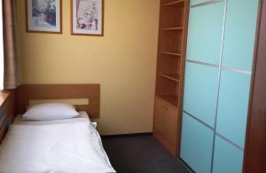 Postel nebo postele na pokoji v ubytování Hotel Cascade