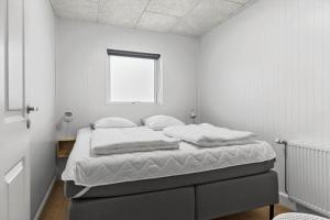 Postel nebo postele na pokoji v ubytování TV1636-Skagen-Skovbrynet-10-st