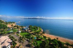 an aerial view of a beach with palm trees and the ocean at Central Private Bedroom & Ensuite - City & Strand Beach Location in Townsville