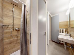 a bathroom with a shower and a sink at Chalet with Stunning Mountain Views in Agettes +32 photos