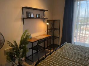 Ένα ή περισσότερα κρεβάτια σε δωμάτιο στο Dk impian Dwest cozy studio