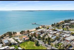 an aerial view of a town next to the ocean at Water views in Cowes
