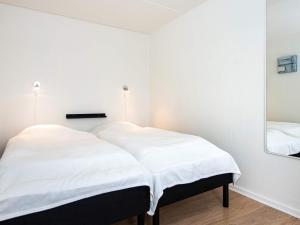 Ένα ή περισσότερα κρεβάτια σε δωμάτιο στο 6 person holiday home in Ringkøbing-By Traum