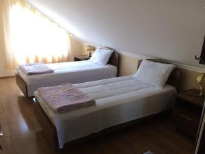 Letto o letti in una camera di Mari Guest House